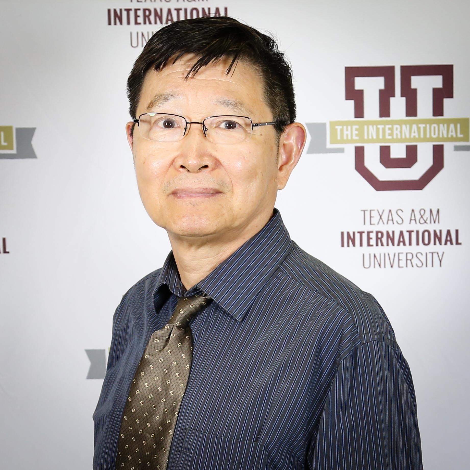 Dr. Qingwen Ni
